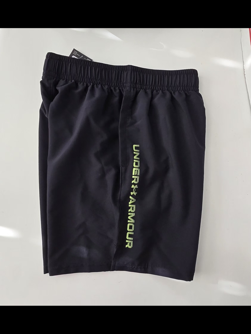 Under Armour Men’s Black Athletic Shorts with Neon Green Logo